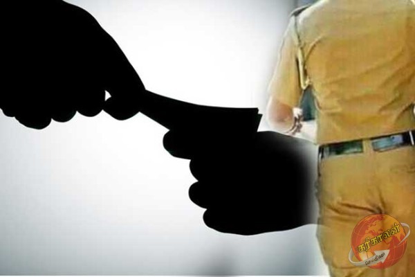 கையும் களவுமாக அதிகாரிகளிடம் சிக்கிய பூவரசங்குளம் பொலிஸ் நிலைய OIC